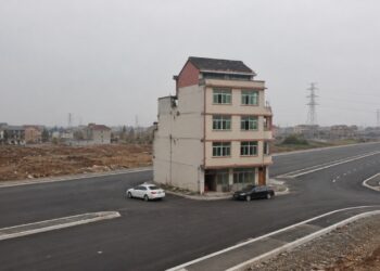 Residential House In The Middle Of Major Highway In China.